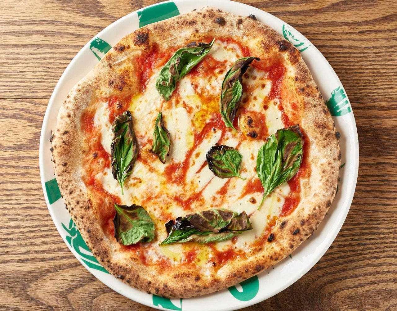 Authentic Neapolitan Pizza Margherita with the aroma of oven-baked pizza