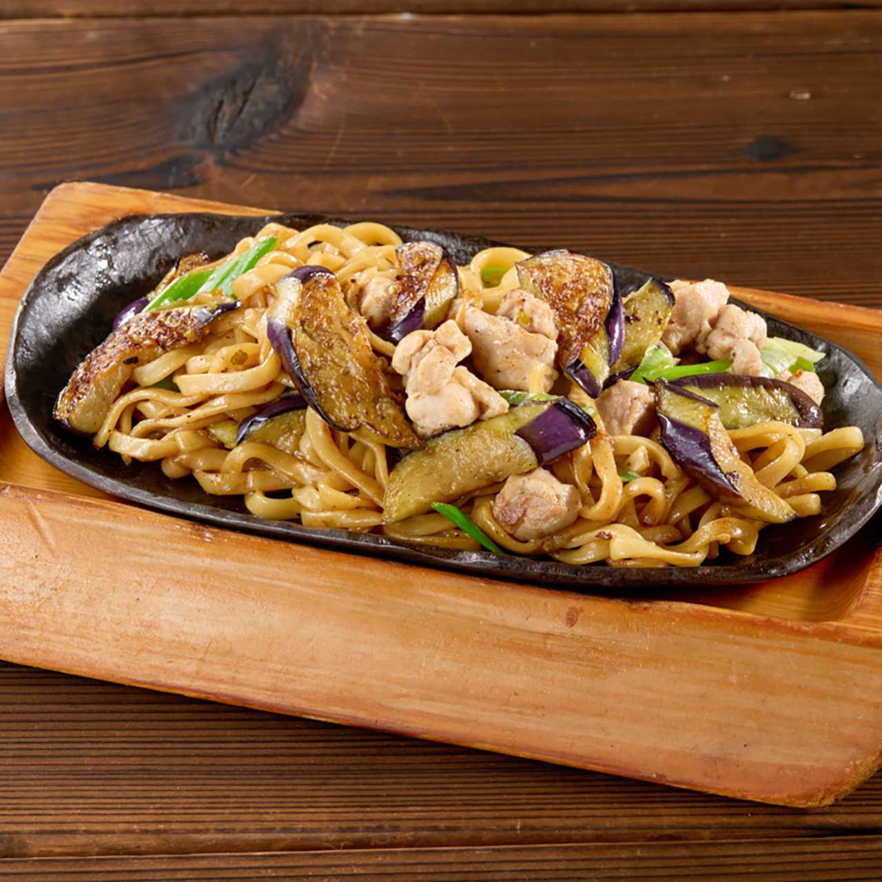 Fried noodles with local chicken and eggplant with yuzu pepper