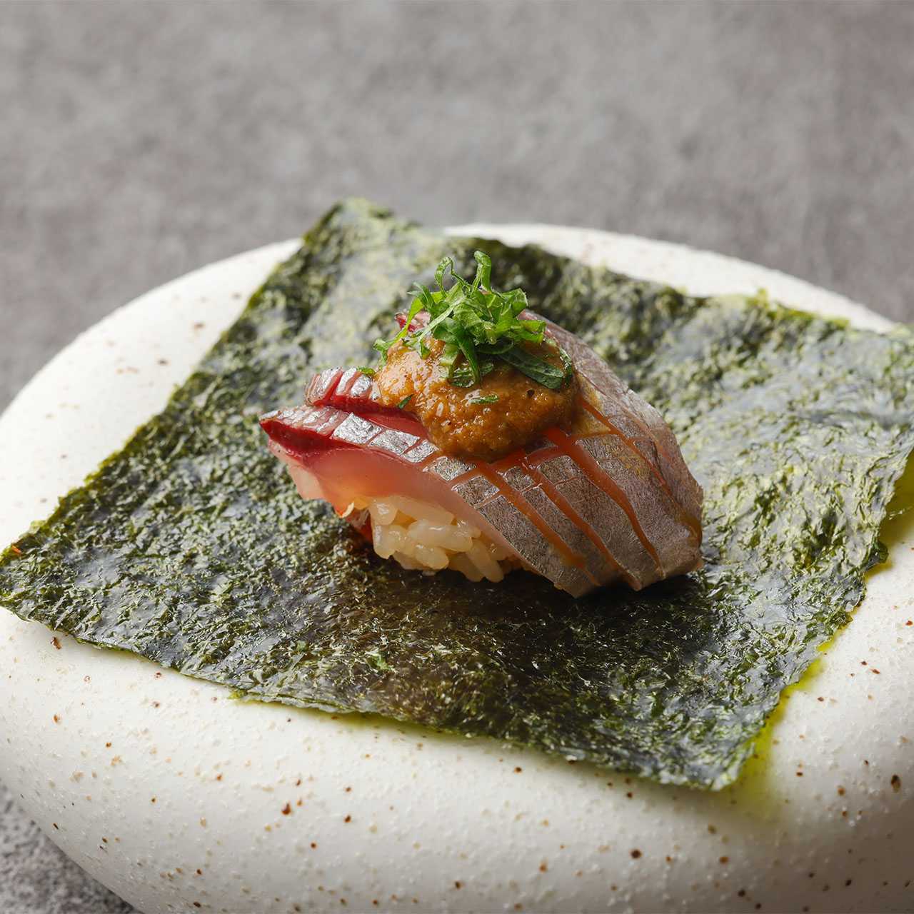 Horse mackerel sashimi with sesame seeds
