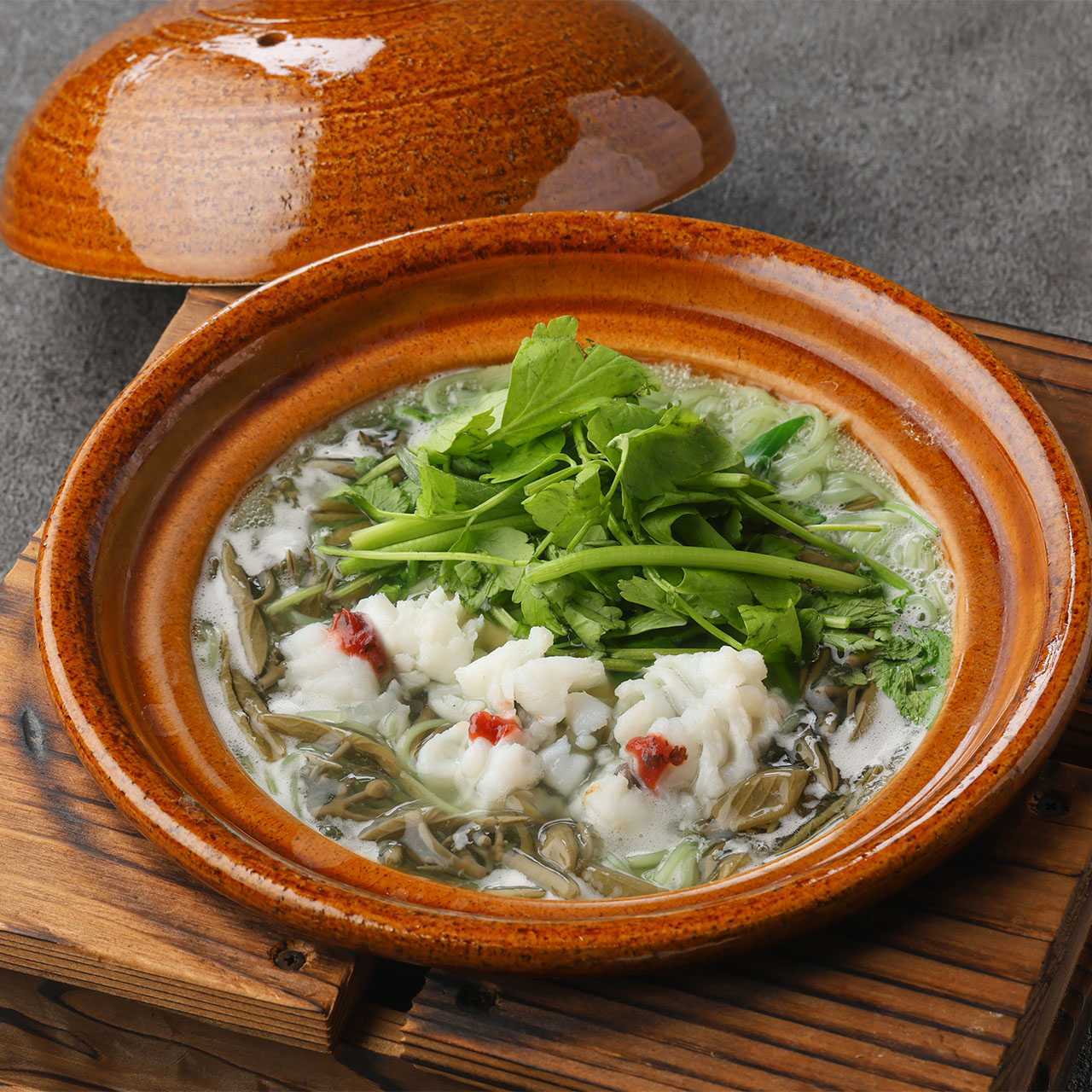 Small pot of conger eel and freshly picked water shield