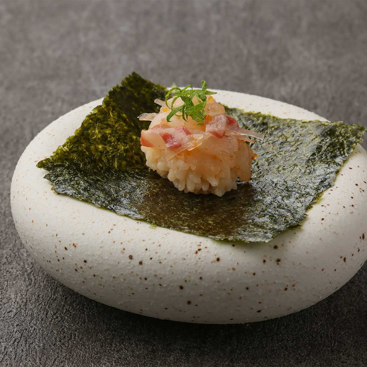 Sea bream marinated in kelp, plum crystal