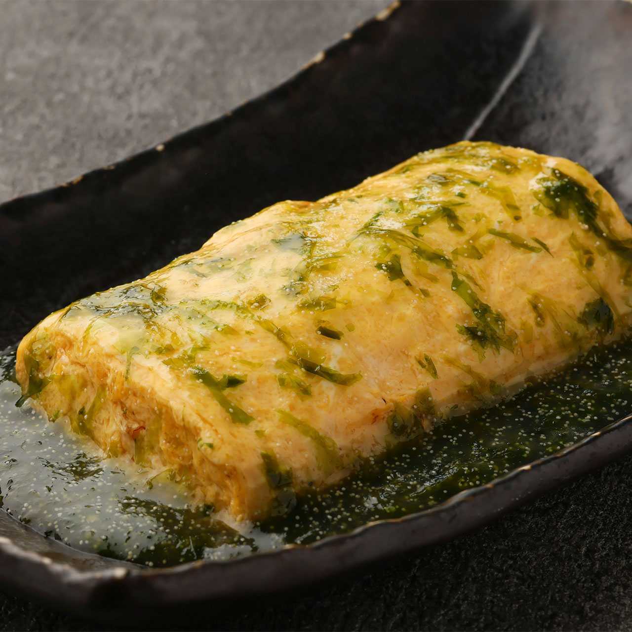 Rolled omelette of sea bream roe with seaweed paste