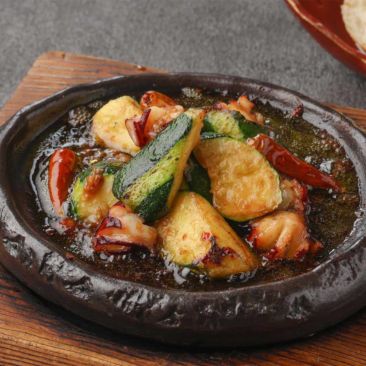Nagoya Cochin gizzard and celery in charcoal oil
