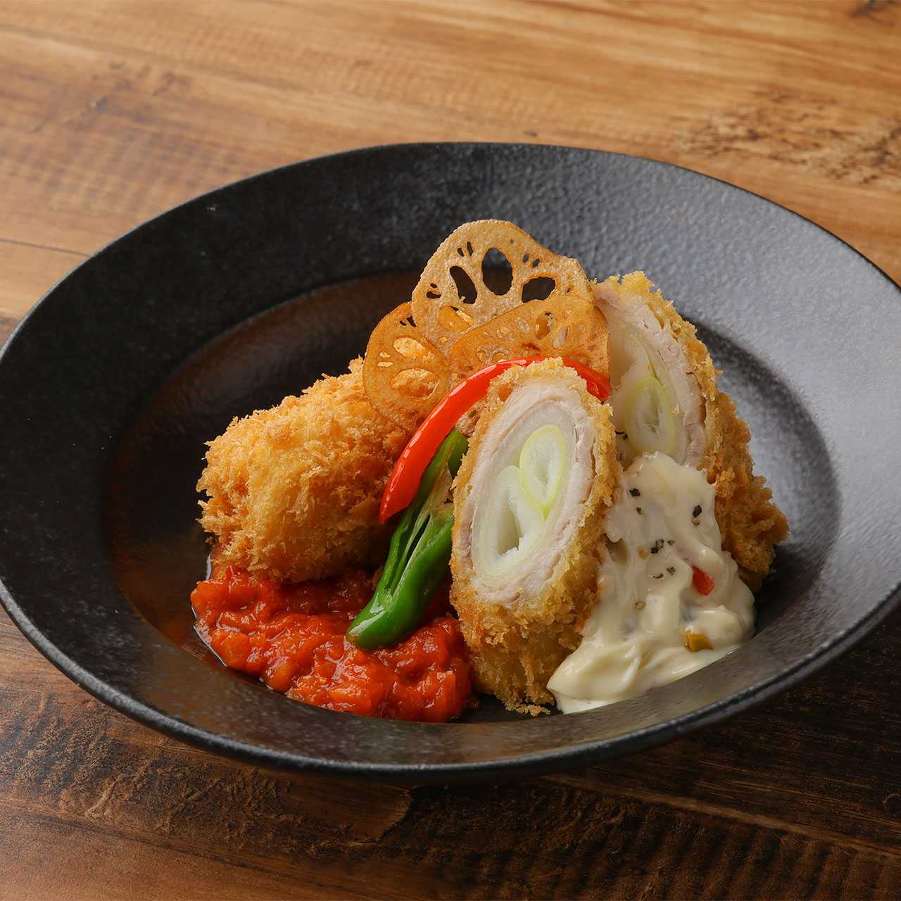 Crab cream croquette and fried pork wrapped in white onion