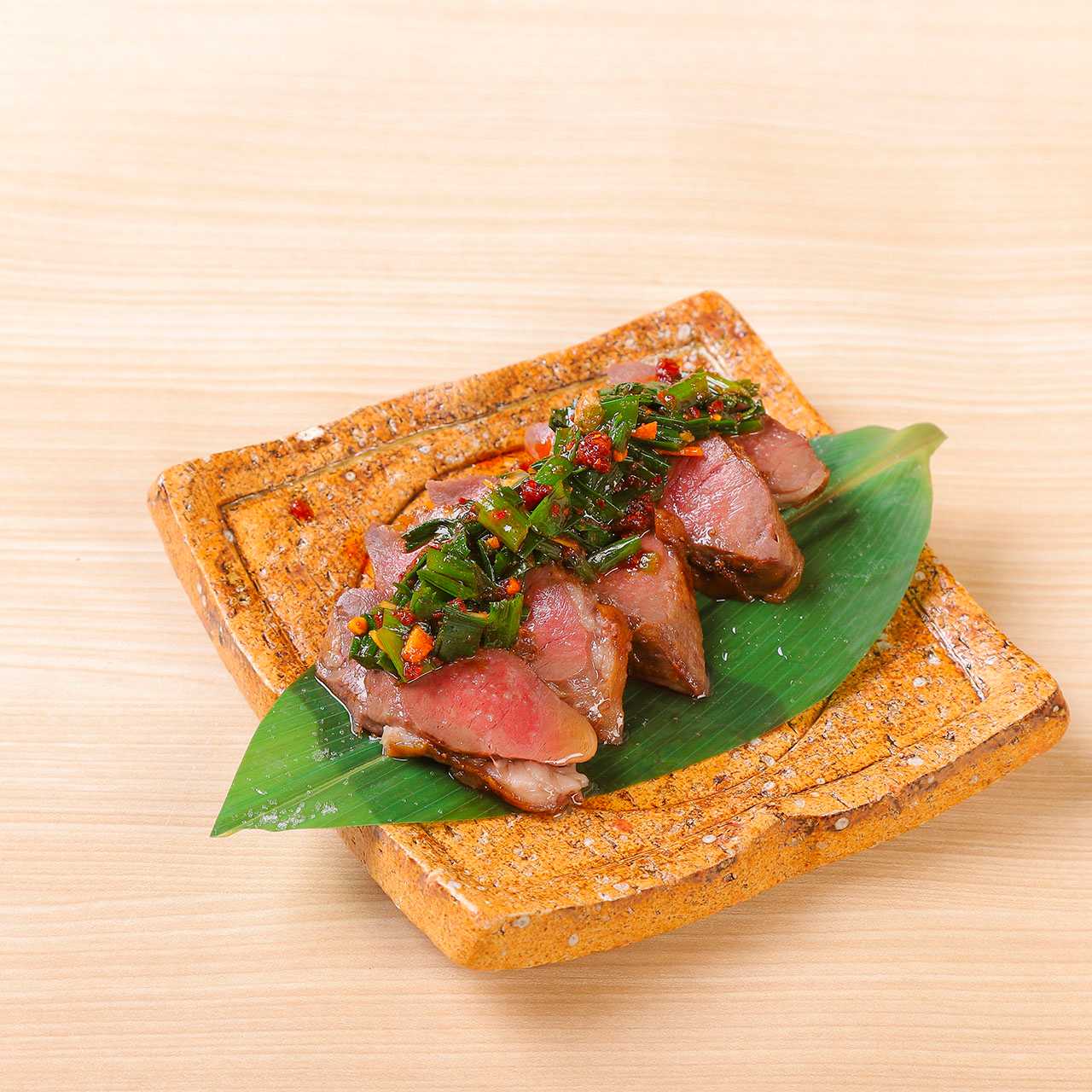 Netted hearts with garlic and chive soy sauce