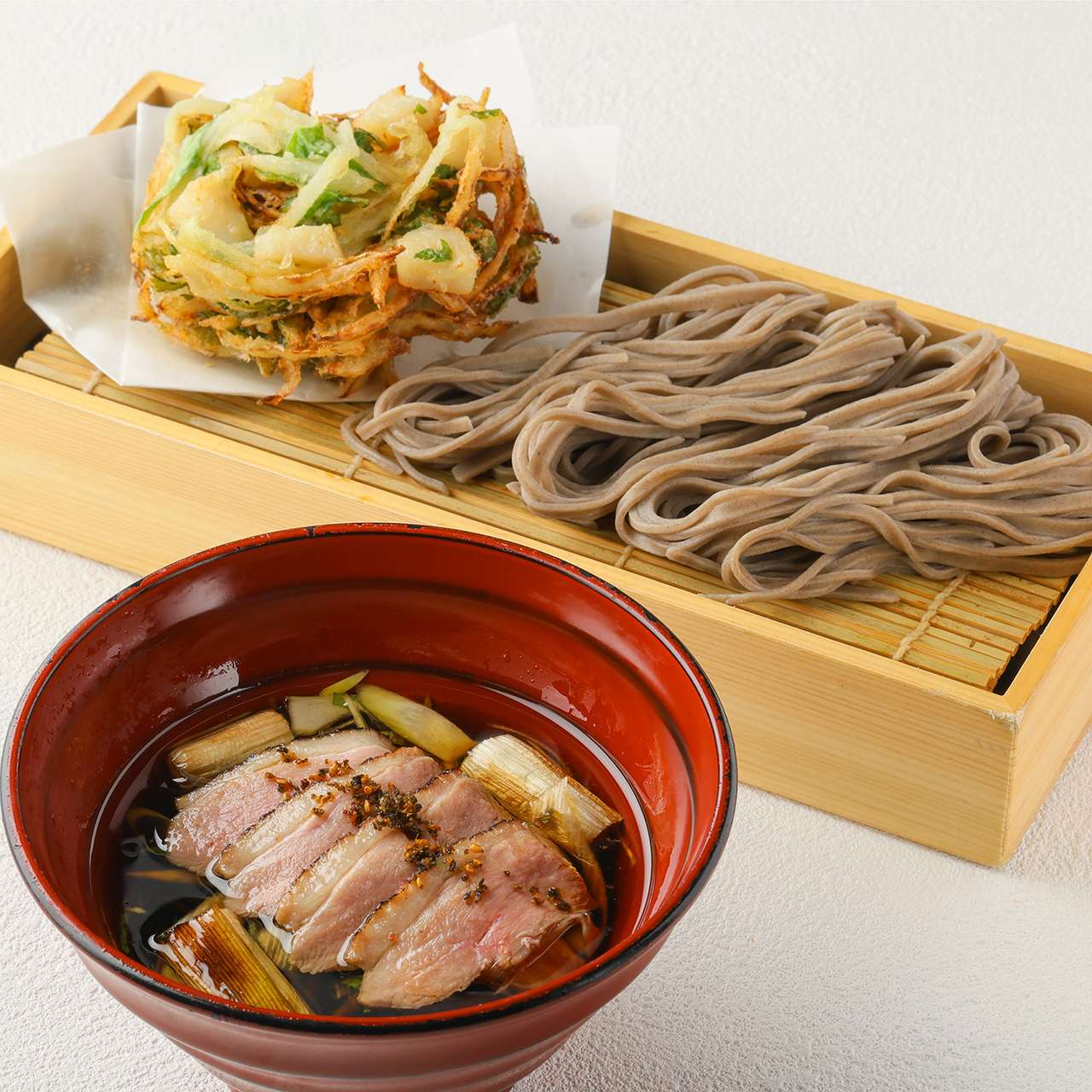 Duck nanban tsukesoba with garland chrysanthemum and shrimp tempura
