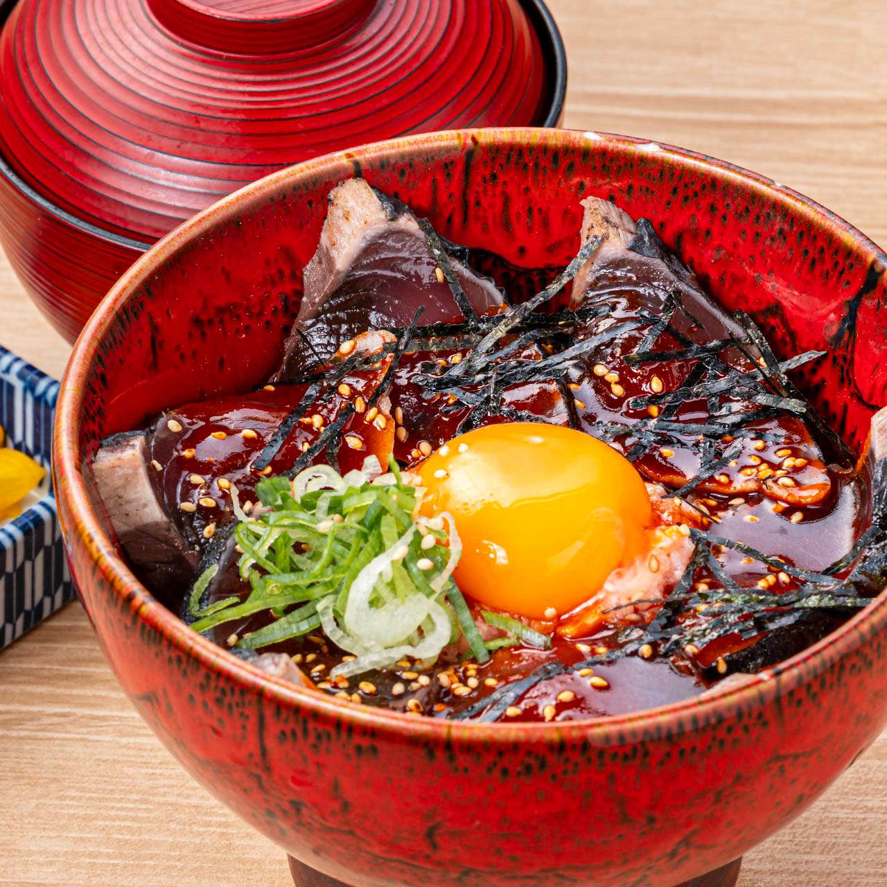 Sweet and spicy Yukhoe rice bowl with straw-grilled bonito