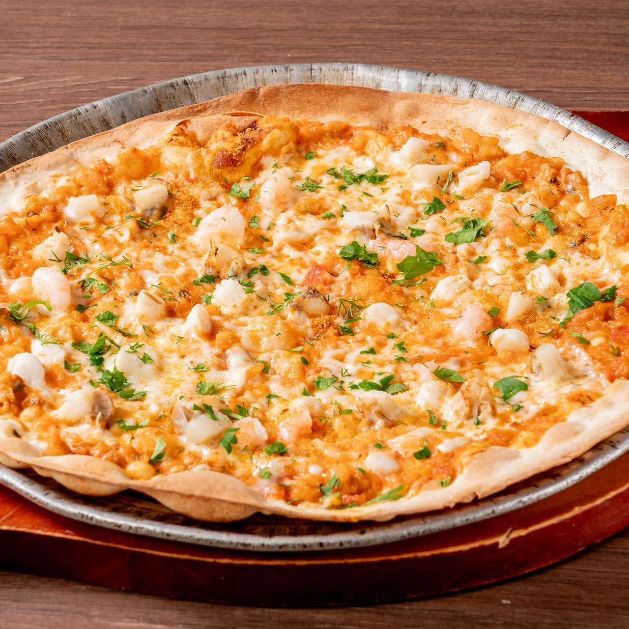 Seafood and dried mullet roe in tomato cream sauce