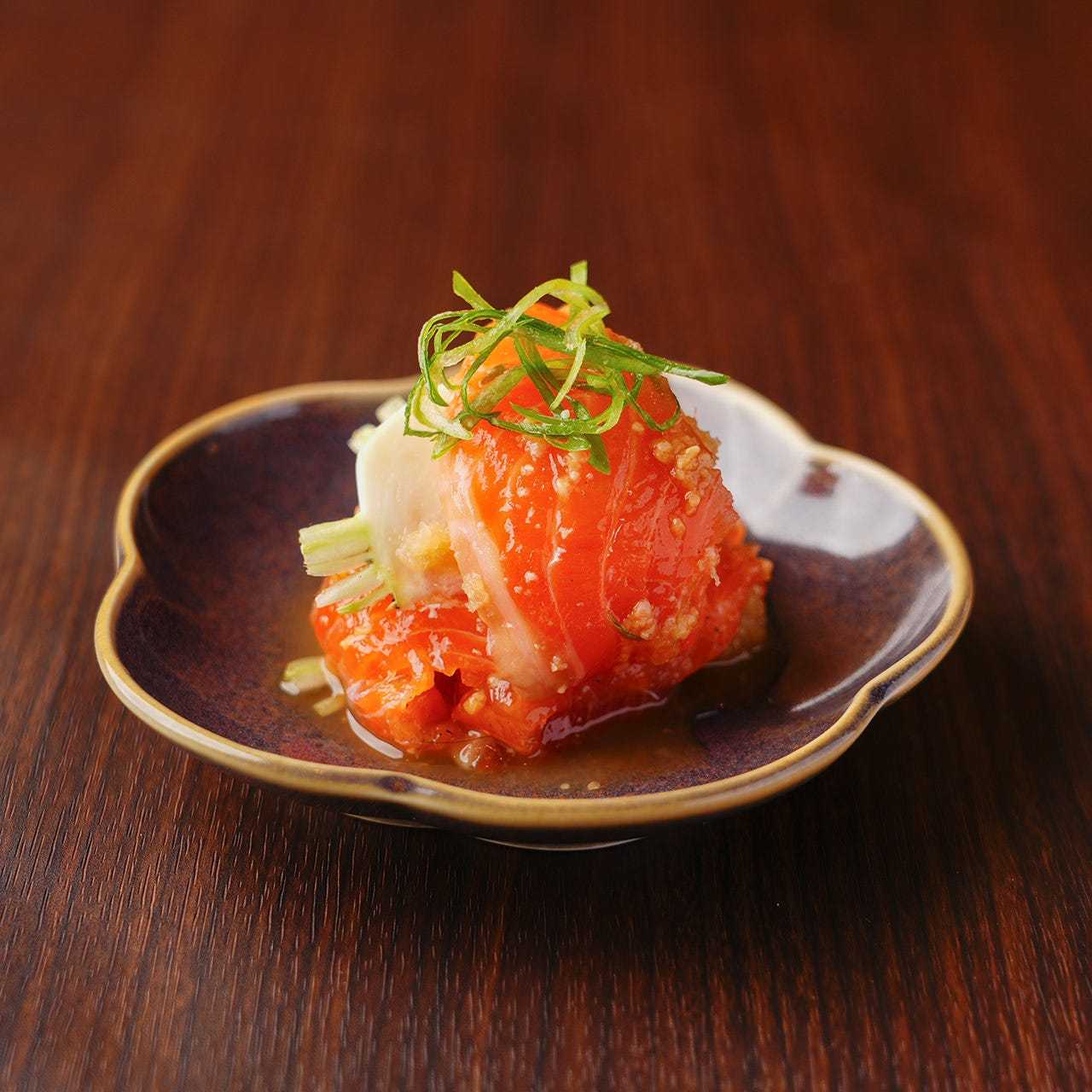 Salmon and turnip dressed with soy sauce and koji