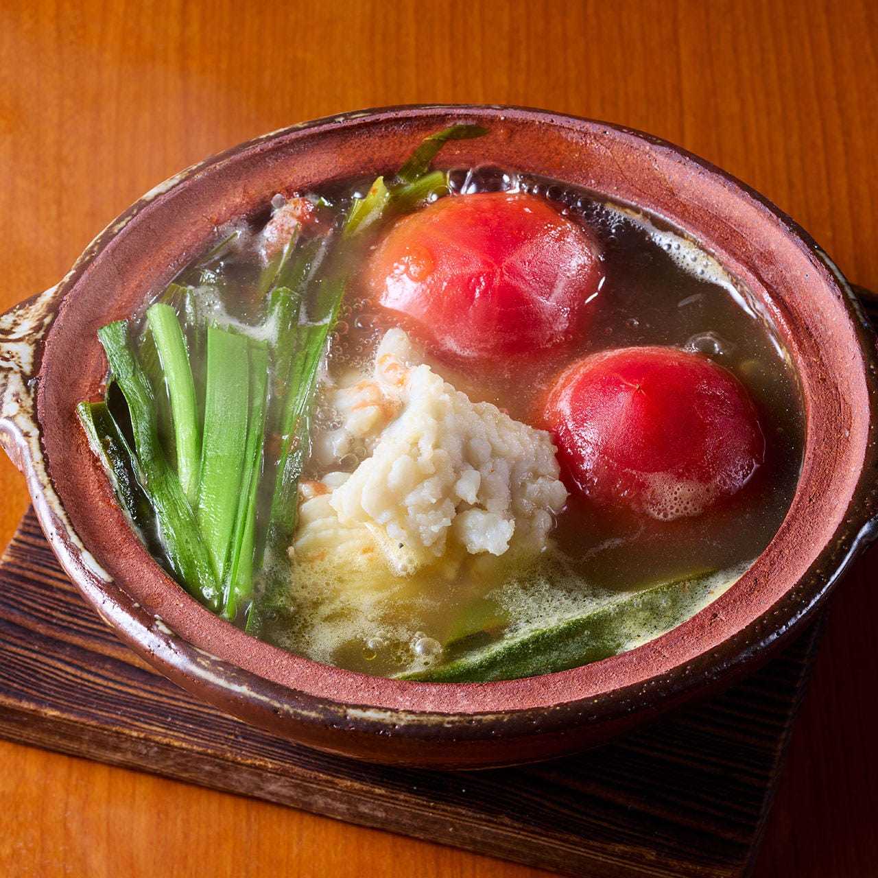 鱧とトマトの韮薫る白チゲ