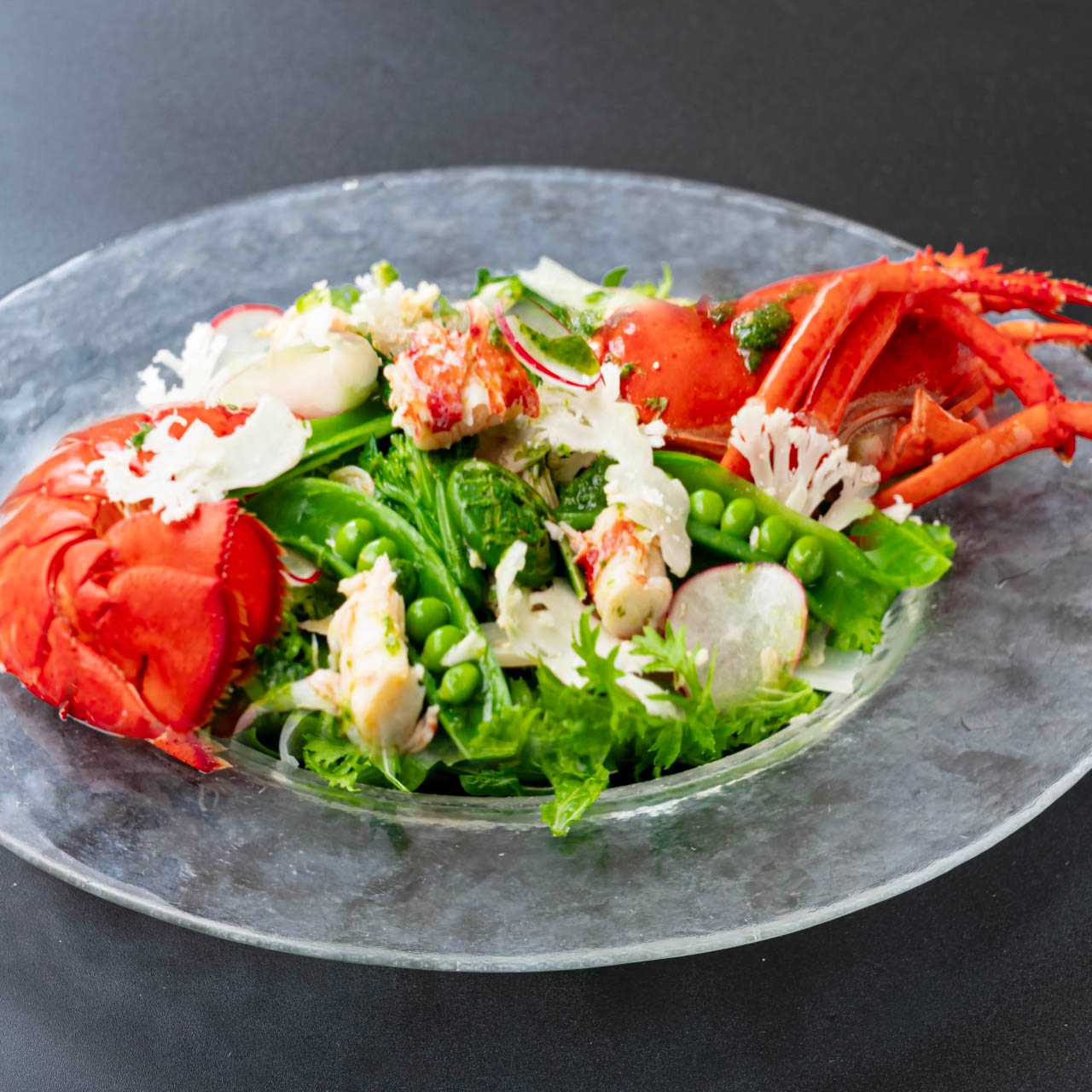 オマール海老と春野菜のサラダ仕立て　グリーンハーブソース