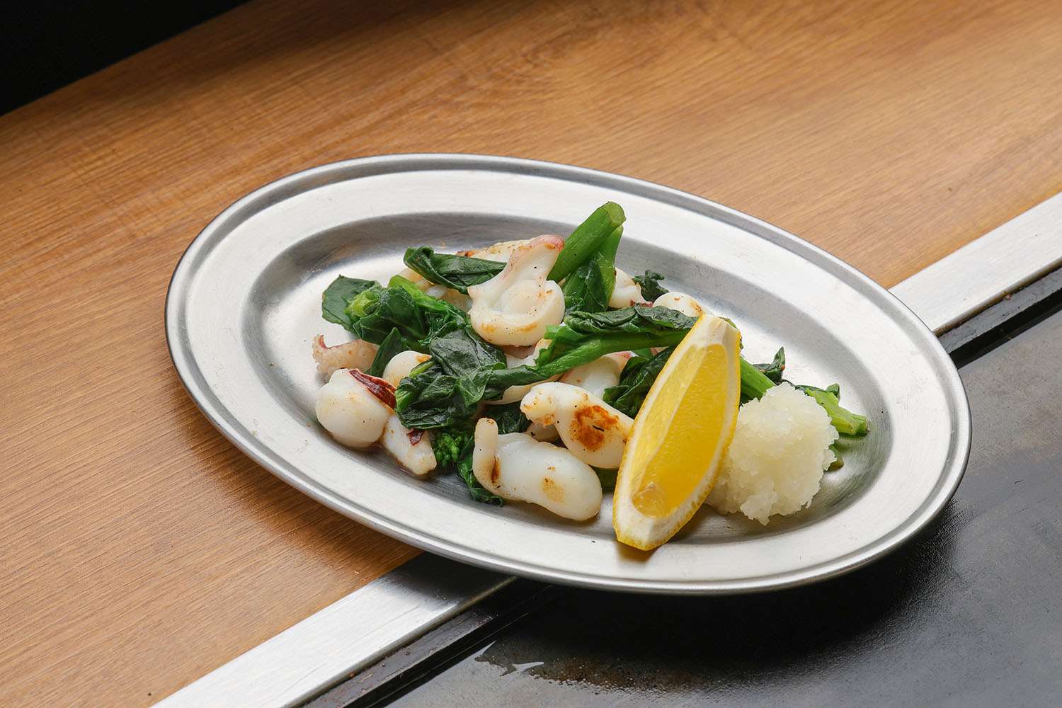 烏賊ゲソと菜花の鉄板塩焼き