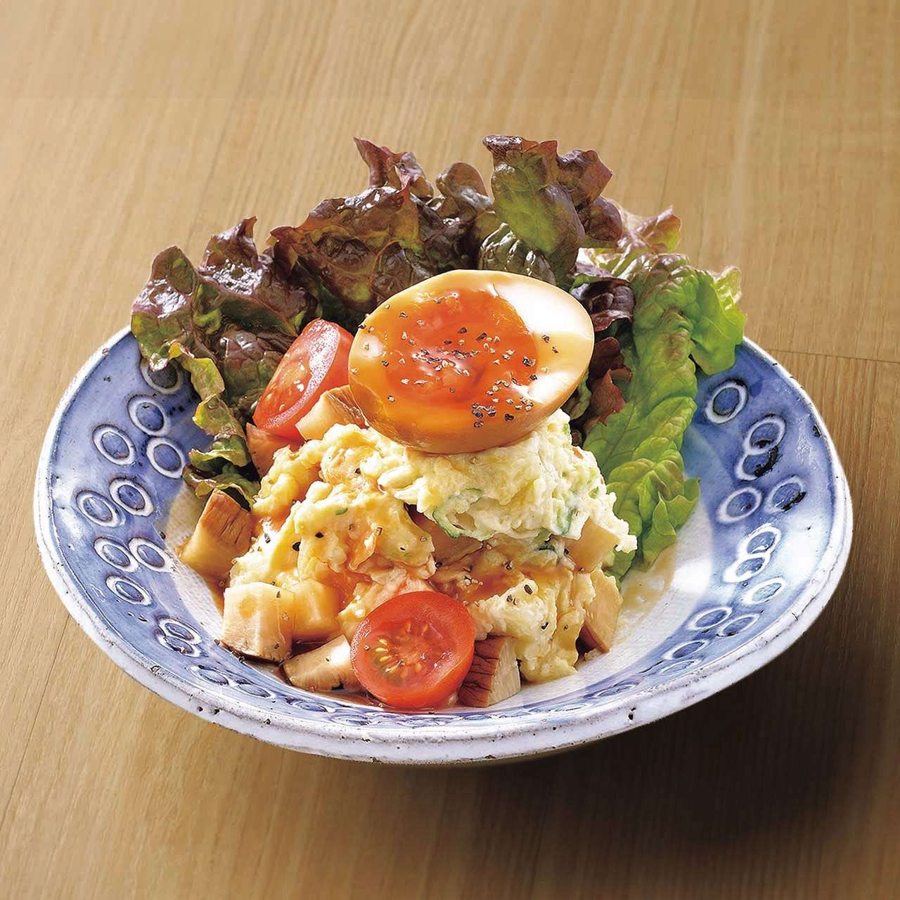 Potato salad with boiled egg and smoked daikon radish