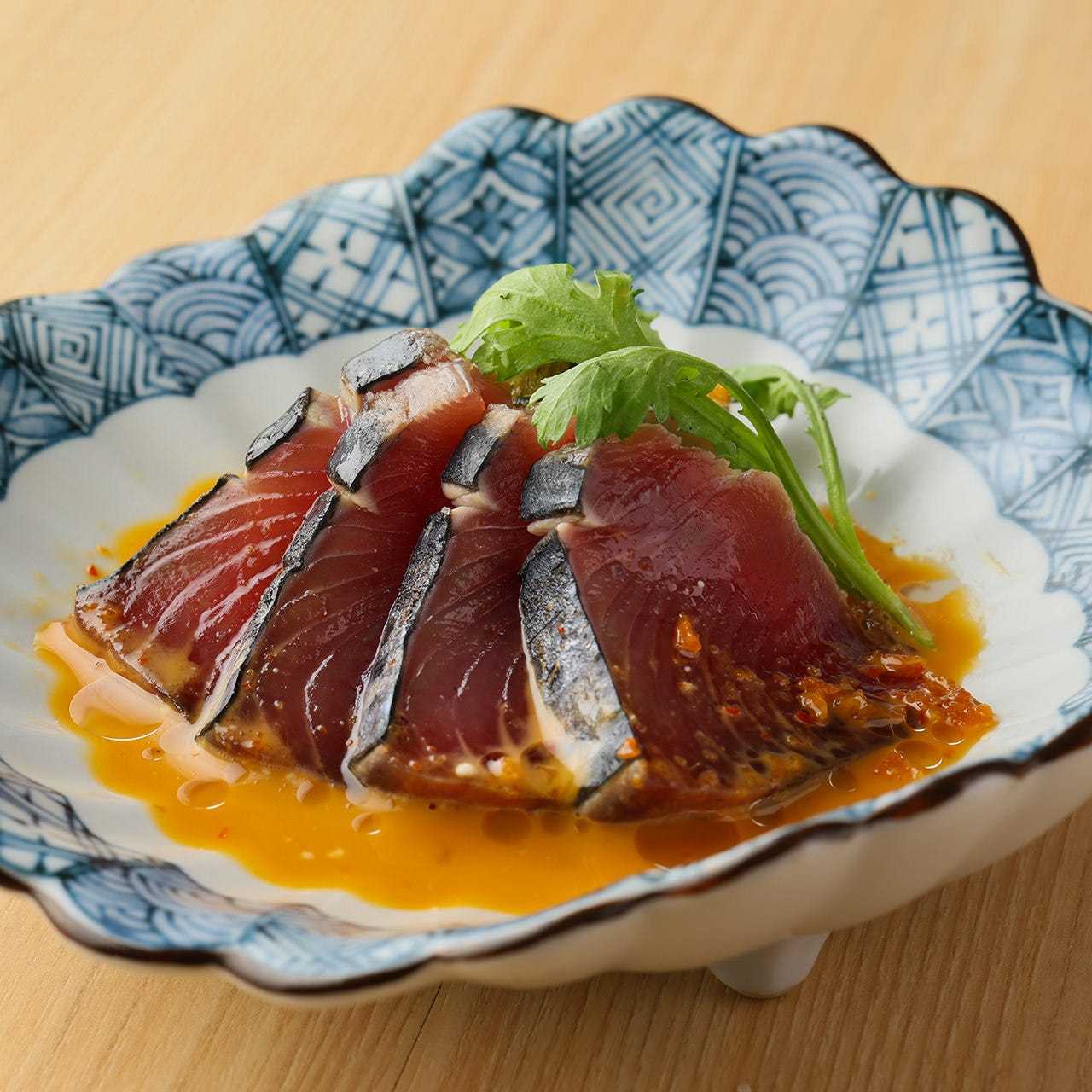 Seared bonito with red yuzu pepper
