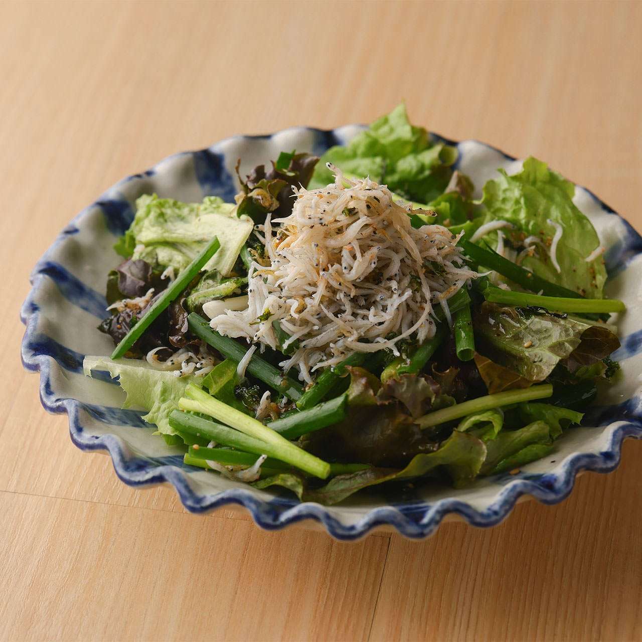 Green salad of boiled whitebait with choregi dressing