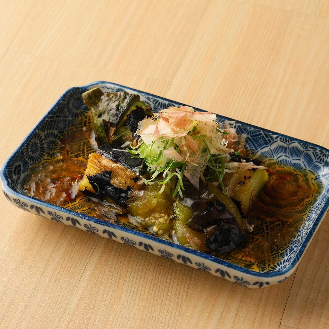 Grilled eggplant with ginger broth and soy sauce