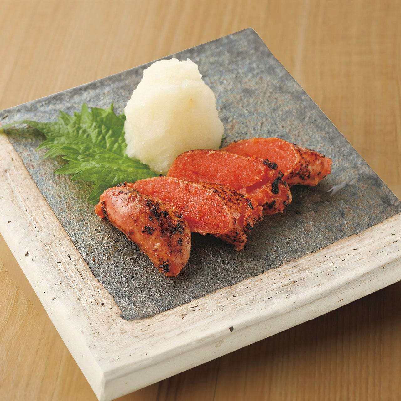 Grilled cod roe with grated radish