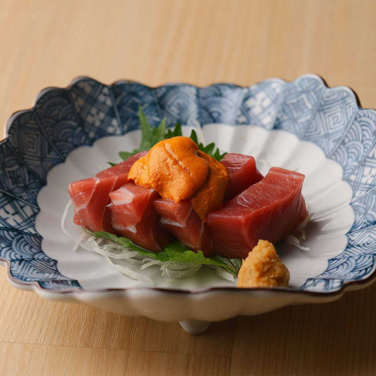 Tuna sashimi topped with sea urchin and mountain wasabi
