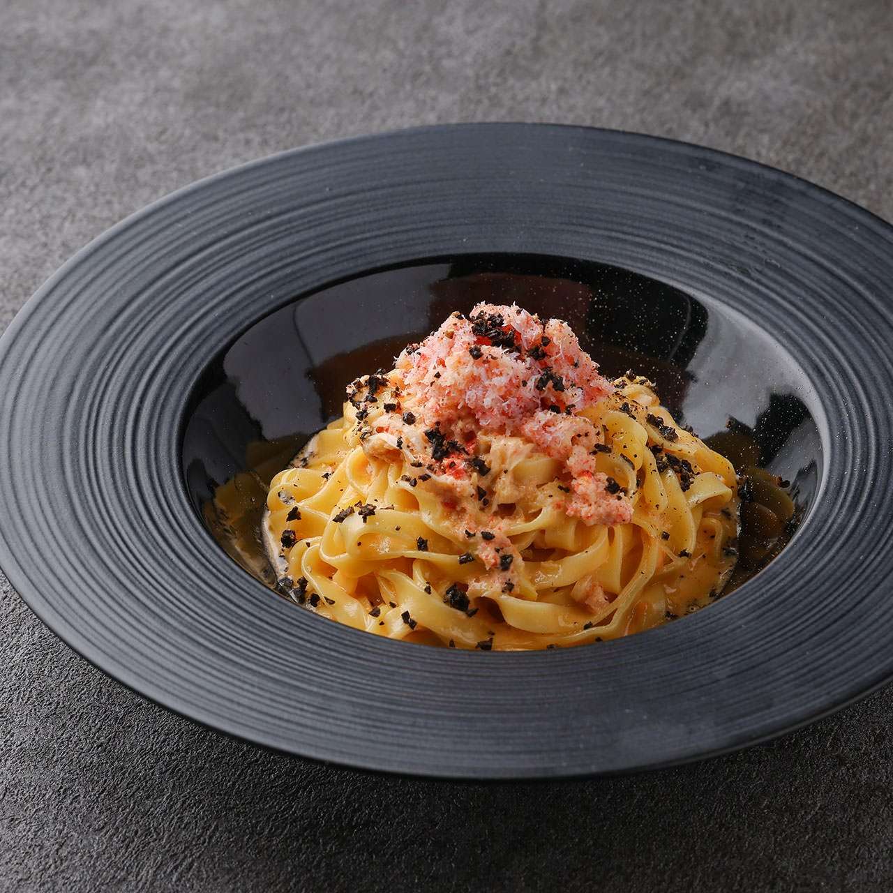 紅ズワイ蟹とトリュフのタリアテッレ ～トマトクリーム～