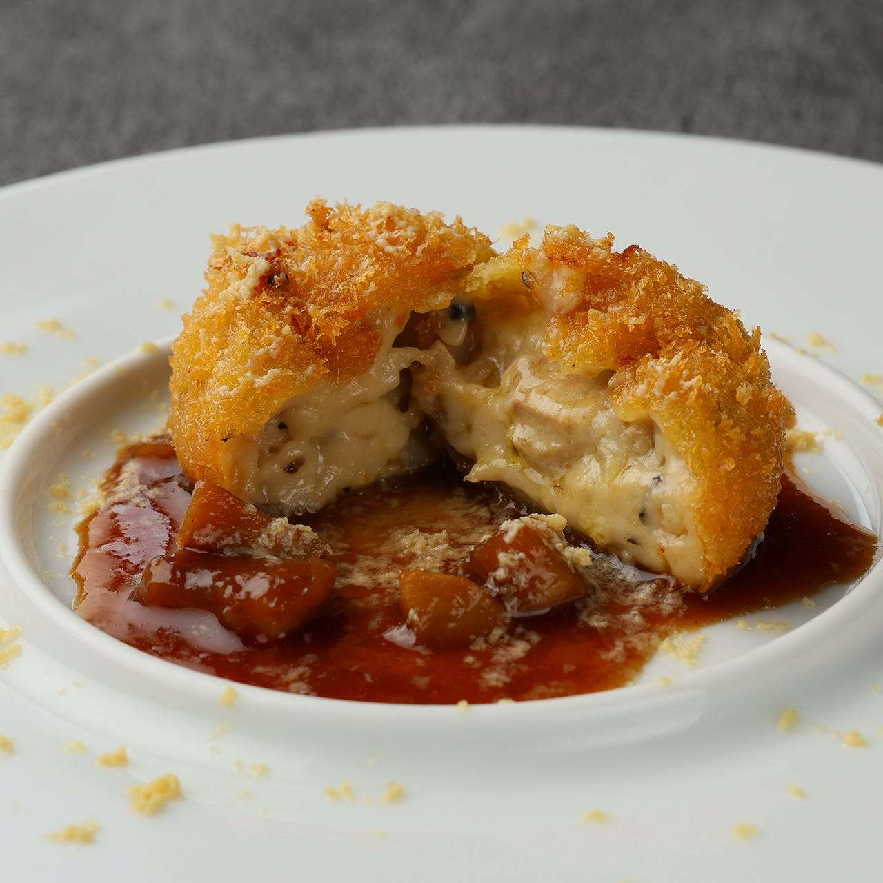 Foie gras croquette with porcini sauce