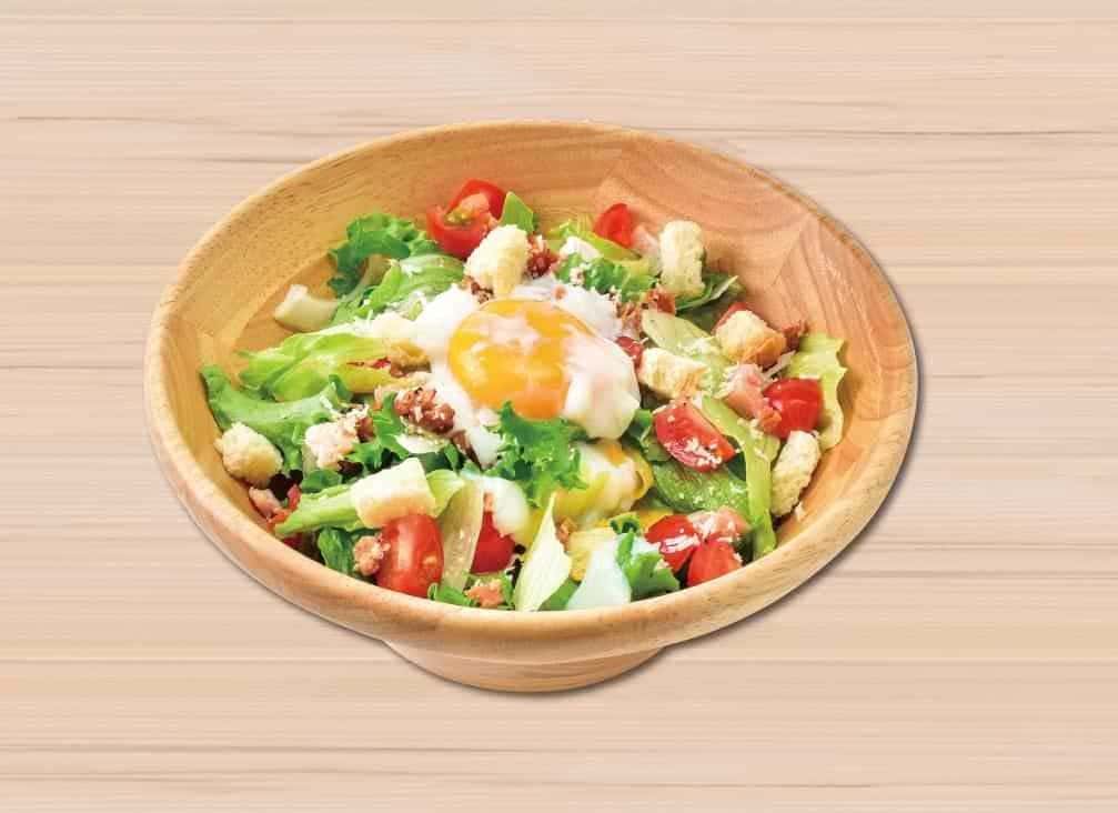 Caesar salad with soft-boiled egg