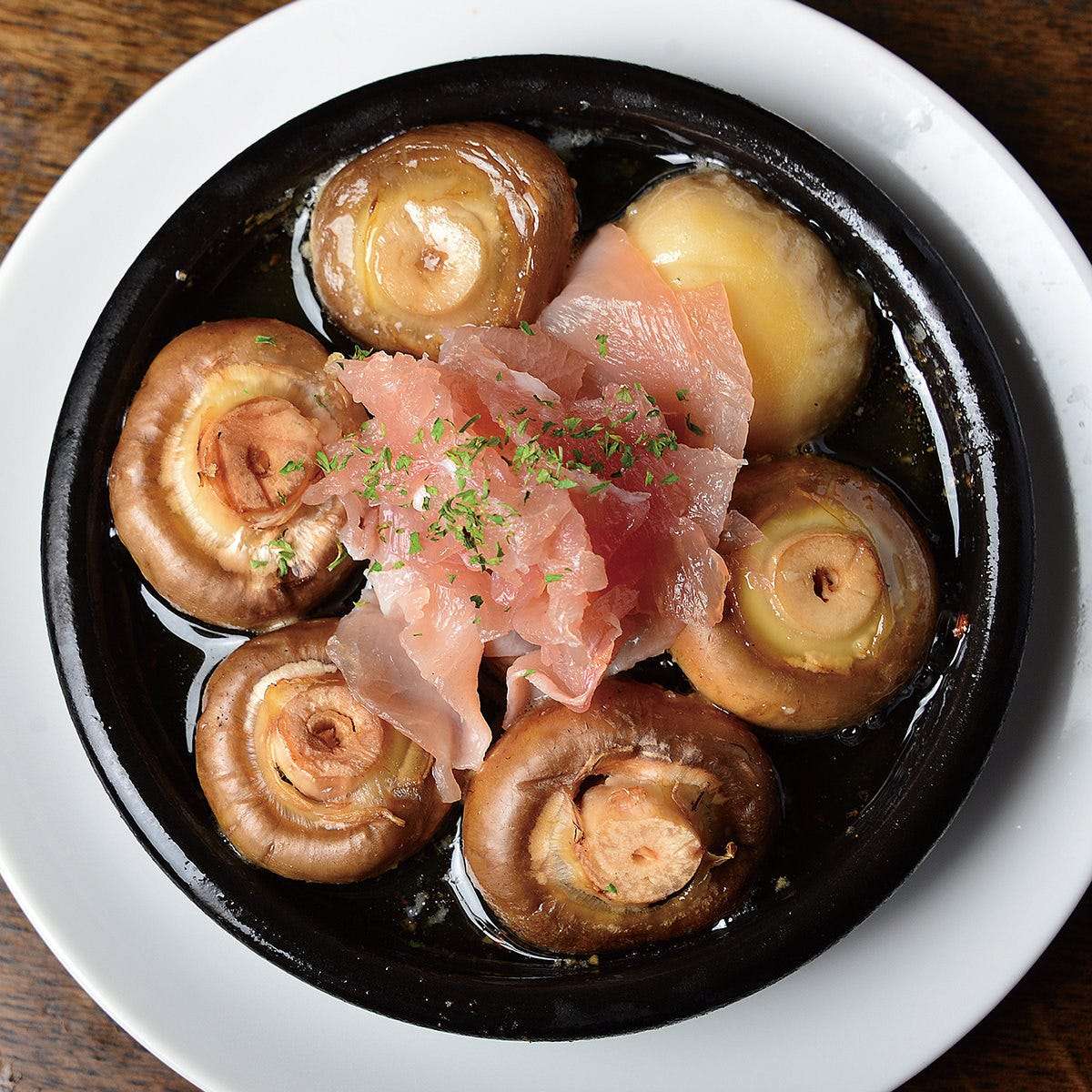 Sautéed prosciutto and mushrooms - Segovia style