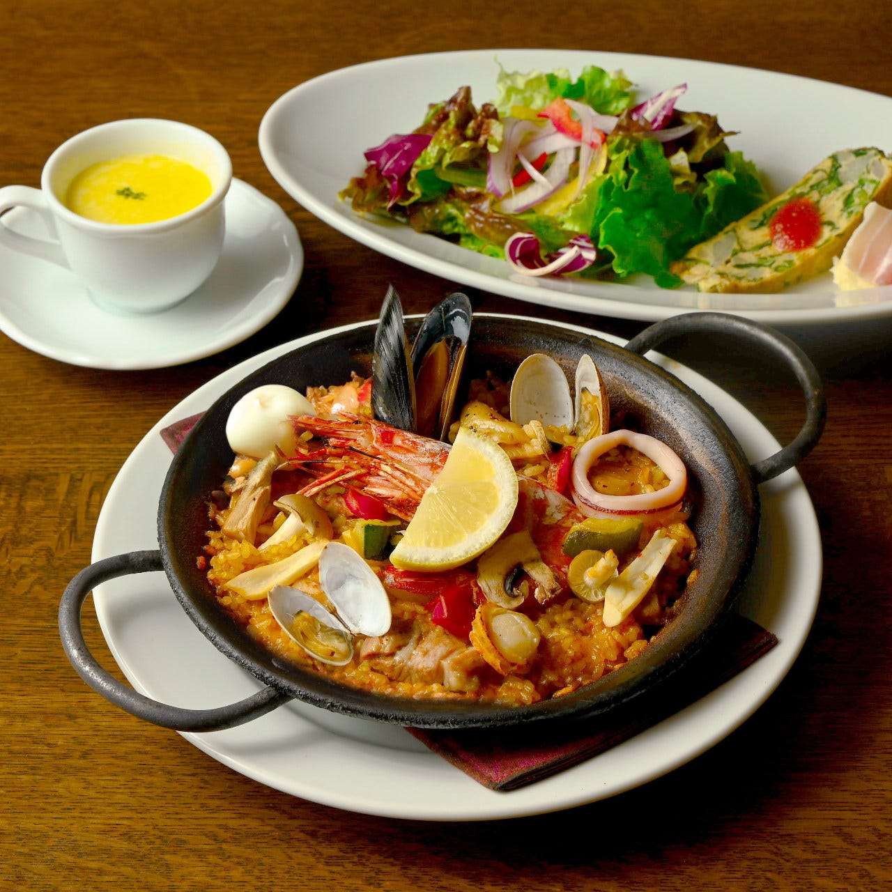 Our most popular dish! Mixed paella with seafood and mountain produce