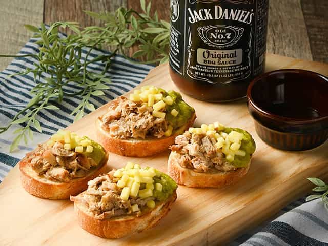 Trendy pulled pork, avocado, and cheese tartine ~served with Jack Daniel's BBQ sauce~