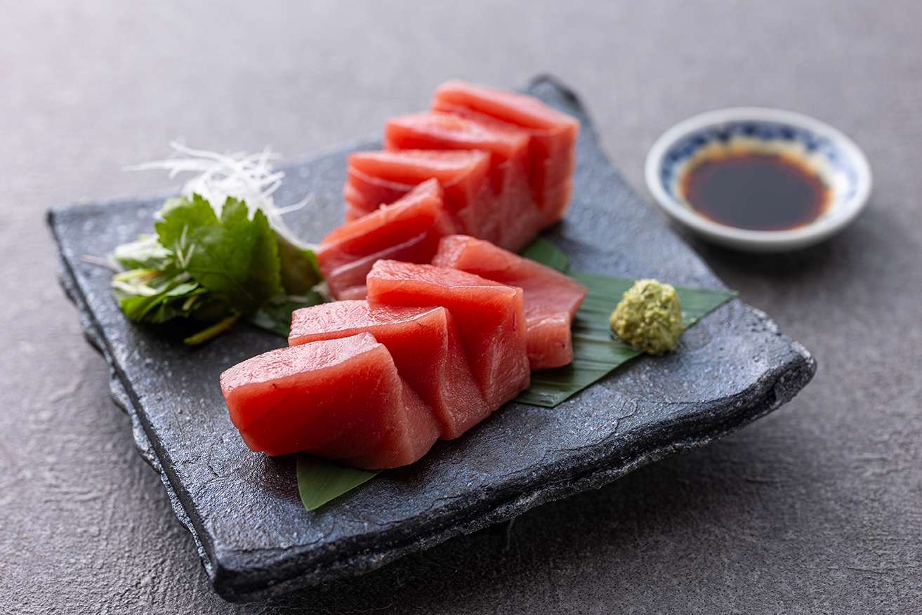 Sashimi served with re-brewed soy sauce